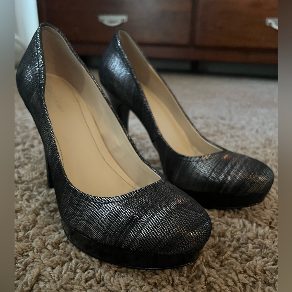 Black and silver 4” heels. Size 8 Calvin Klein. Worn only once